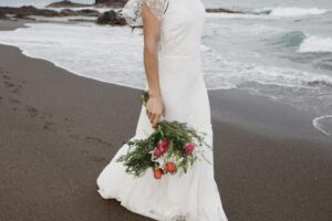 woman wedding dress beach